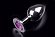 Большая серебристая анальная пробка с круглым кончиком и ярким фиолетовым кристаллом - 9 см.